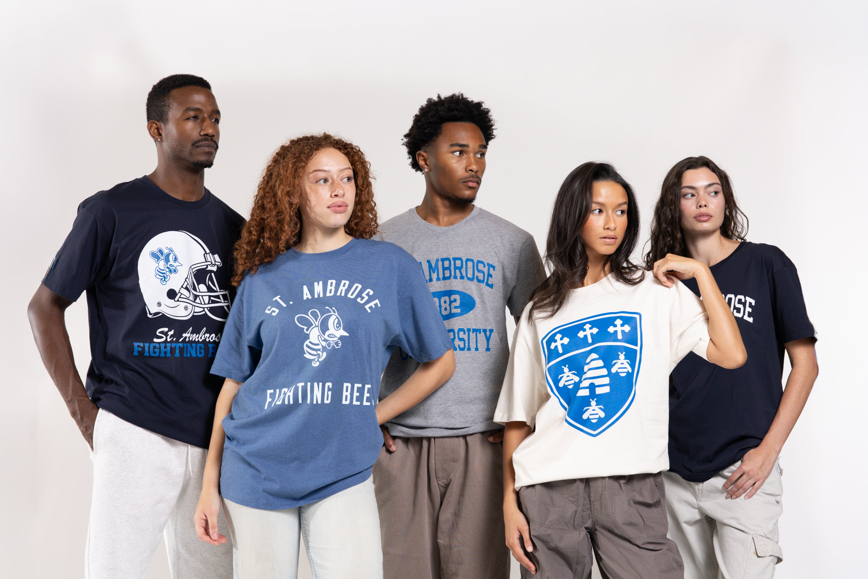 Five people wearing St. Anbrose University t-shirts on a white background